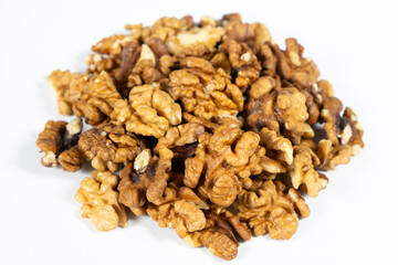 Shelled walnuts on a white background close-up