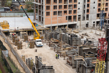 Construction site with crane and scaffold