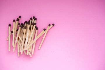 The matches lie on a pink background, a view of the top. There is a space for the text. International match day.