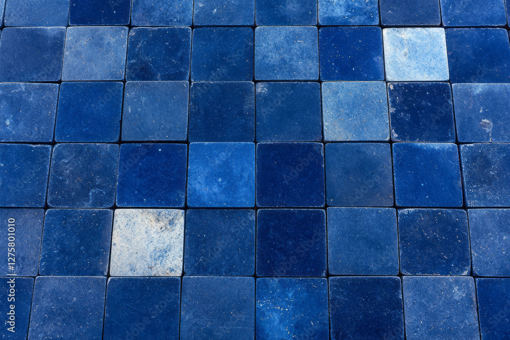 Poster Grid of uniform cubes in neat rows, with select cubes dissolving, leaving gaps and scattered debris