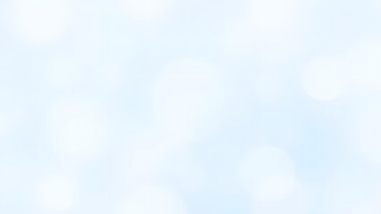 Soft blue sky with bokeh and blurred clouds