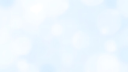 Soft blue sky with bokeh and blurred clouds