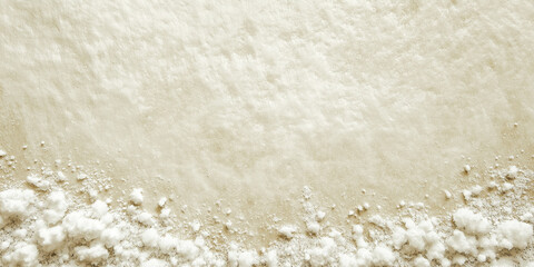  Fine white powder scattered across soft surface