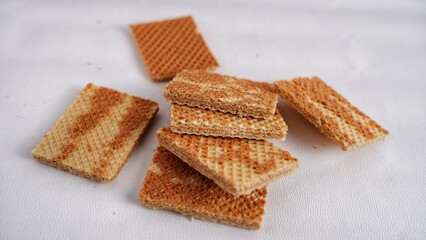 The sweet and layered brown wafers with chocolate and vanilla flavors with closeup view