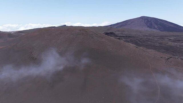 France - Reunion Island - Piton de la Fournaise - Approaching Mont Chisny with clouds
