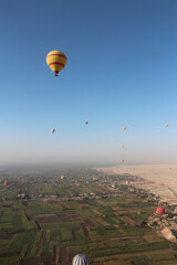 Landscape on East and West bank of Luxor with a hot air balloon, Egypt