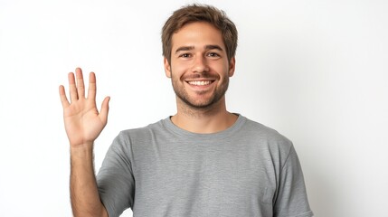 Naklejka premium A smiling man in a blue T-shirt waving his hand at the camera against a black background. Presenting. Bussinessman. Ideas