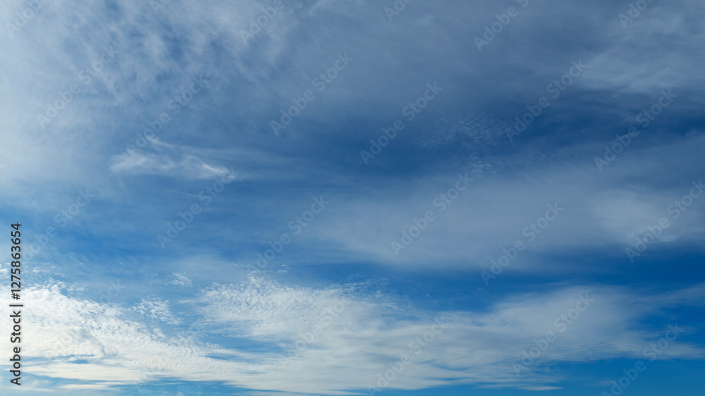 Wall mural beautiful blue sky with soft white clouds for abstract background
