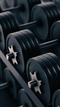 close-up of a rack with dumbbells, concept of fitness and getting stronger (3d render)