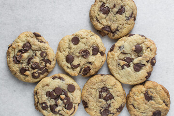 Overhead view of chocolate chip cookies, top view of homemade chocolate chip cookies on a white background