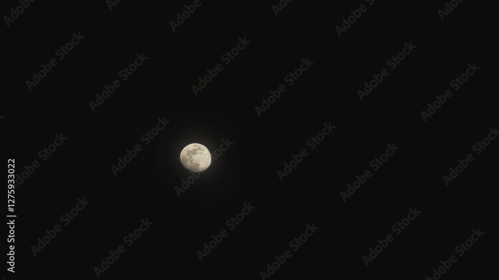 Sticker moon moving up with a dark background