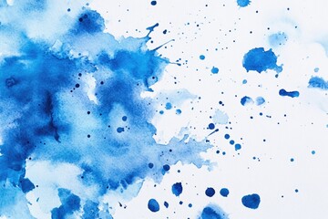 A close-up view of a blue watercolor paint splatter, great for creative projects and art designs