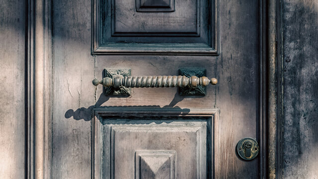 old wooden vintage door with handle and lock