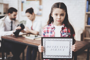 Detective with Clients in Private Detective Agency