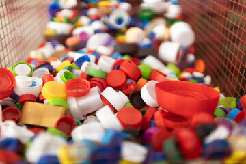 Collection of colorful plastic caps for recycling purposes