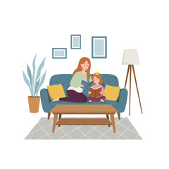 Mother Reading Storybook to Daughter on Sofa in Cozy Living Room