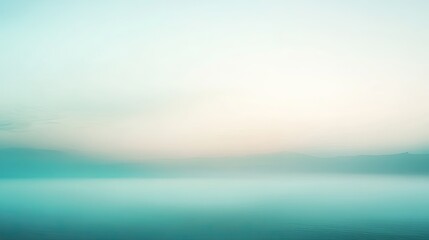 Obraz premium A gradient from muted green to blue, symbolizing a calm and refreshing atmosphere.