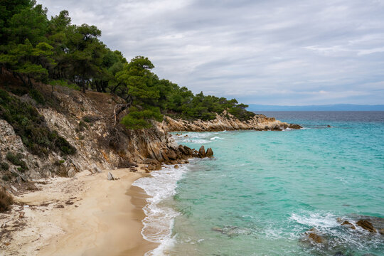 Mega Portokali Beach with Turquoise Waters on a Cloudy Day, Greece