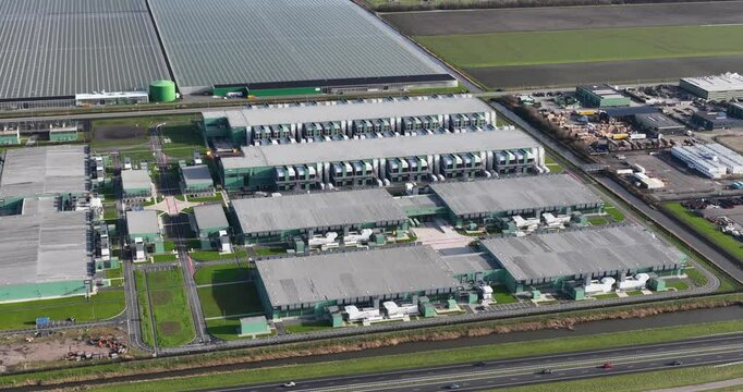Hyperscaler, data center, cloud computing infrastructure, big data and IT, AI, infrastructure. Aerial drone views.