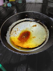 Picture, a frying pan filled with hot oil