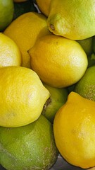 Fresh lemon and lime on a bright background. Vibrant citrus fruits, perfect for food, health, and summer designs