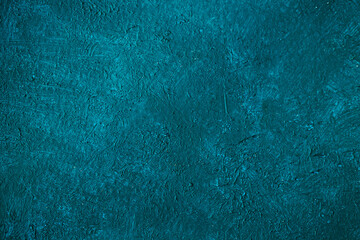Abstract decorative turquoise dark textured background.
