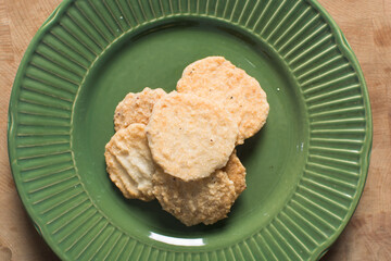 Overhead view of gurundi chips, top view of nigerian coconut biscuits, Nigerian coconut cookies made with coconut and cassava