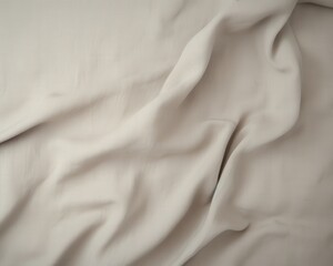 Fabric background a neutral, beige fabric with soft folds and smooth texture for textile design