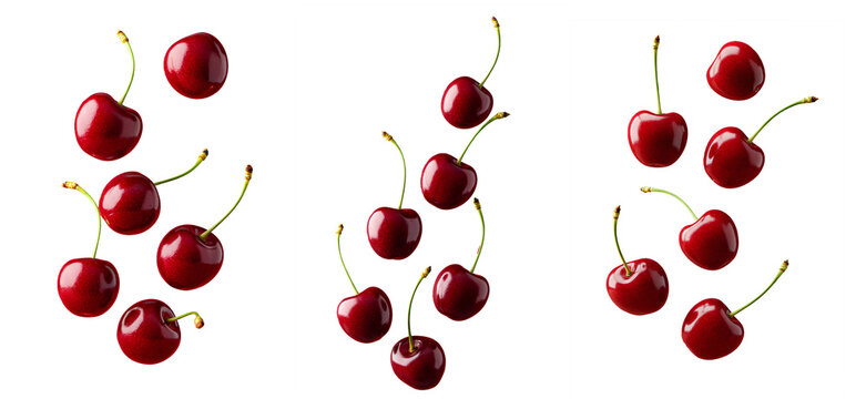 cherry png. cherries isolated. Fresh cherries falling down isolated. Juicy red cherries tumbling in mid-air png. Cherries dropping from above in motion isolated. Ripe cherries scattered while falling