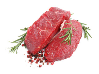 Pieces of raw beef meat and spices isolated on white, above view