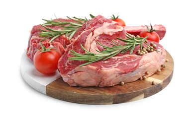 Pieces of raw beef meat, spices and tomatoes isolated on white