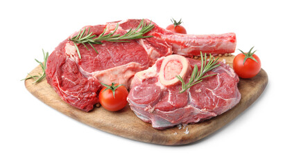 Pieces of raw beef meat, spices and tomatoes isolated on white