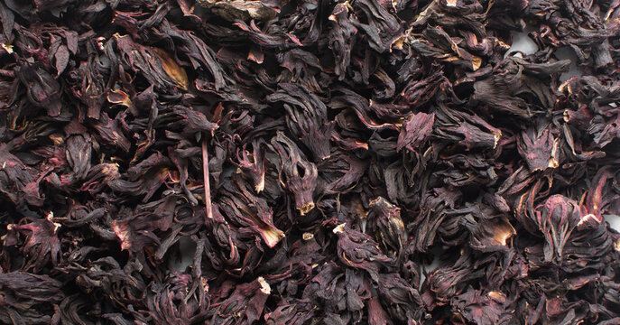 Overhead view of dried roselle, top view of dried hibiscus and Sorrel flowers, ingredient for making nigerian zobo drink