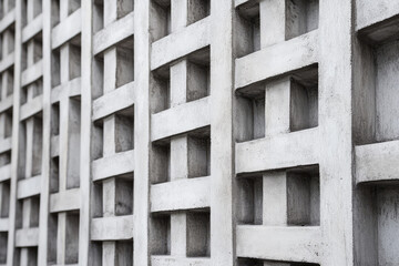 A brutalism-inspired design with minimalistic lines, a monochromatic gray palette, and textured patterns that evoke urban architecture, perfect for a stark, bold backdrop