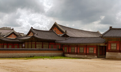 Majestic Korean Palace With Traditional Wooden Structures And Curved Tiled Roofs Reflecting Cultural Heritage
