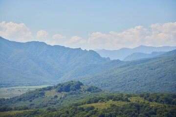 Fototapeta premium Beautiful mountain landscape. Natural beauty. Forest and mountain peaks