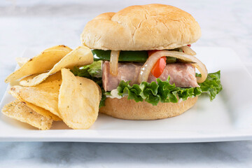 spam burger  top with  peppers and onions
