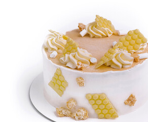 Sweet cake with white chocolate and crumble topping on white background