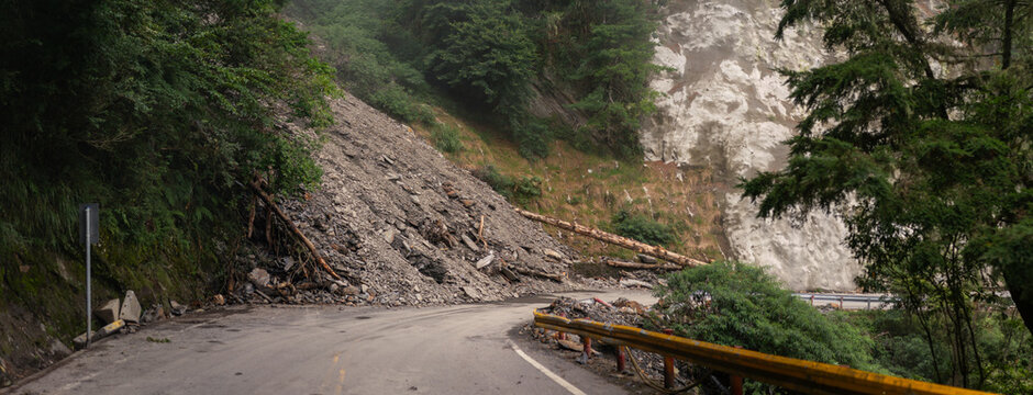 Massive Landslide Blocks Winding Mountain Road, Scattering Debris and Fallen Trees Across Rugged Terrain in Taiwan