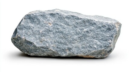 Fototapeta premium Close up view of a gray, rough textured rock isolated on a white background. The rock is irregularly shaped with visible grains and subtle color