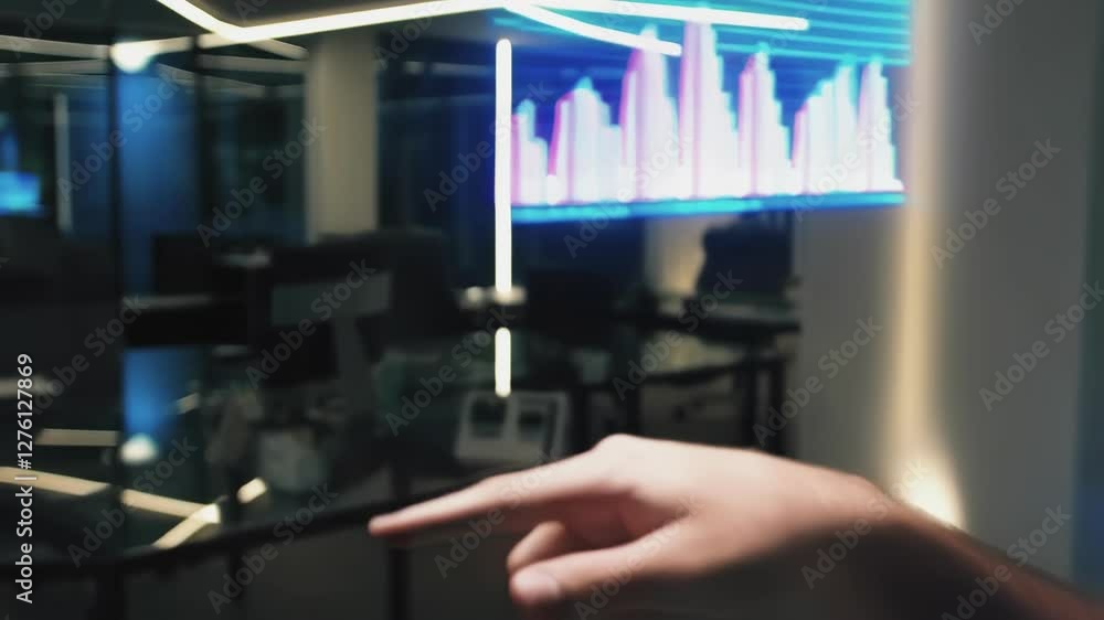 Poster modern office setting showcases a businessman interacting with holographic financial charts, demonst