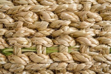 Woven texture of straw close-up.  For backgrounds, crafts, and textures