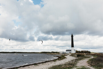 lighthouse on the shore of the sea