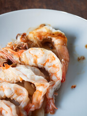roasted peeled prawns on white plate