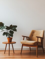 Minimalist interior with a wooden armchair and potted plant, creating a cozy and modern atmosphere.