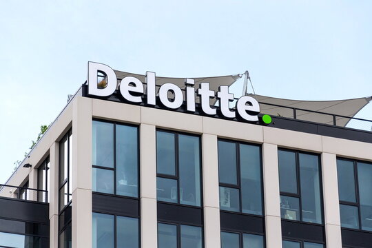 Deloitte professional service company network logo on the building of the Czech headquarters on April 30, 2020 in Prague, Czech Republic.