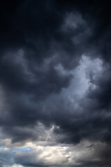 Unusual dark gray layered stratus clouds, skyscape.