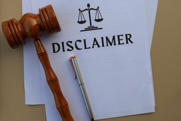 Disclaimer Notice with Judge’s Hammer and Writing Pen