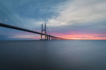 Vasco da Gama bridge over tagus (Tejo) river in Lisbon, Portugal, before sunrise