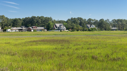 Chincoteague, landscape with houses on the shore! at the entrance to the island. A popular tourist destination on the East Coast.